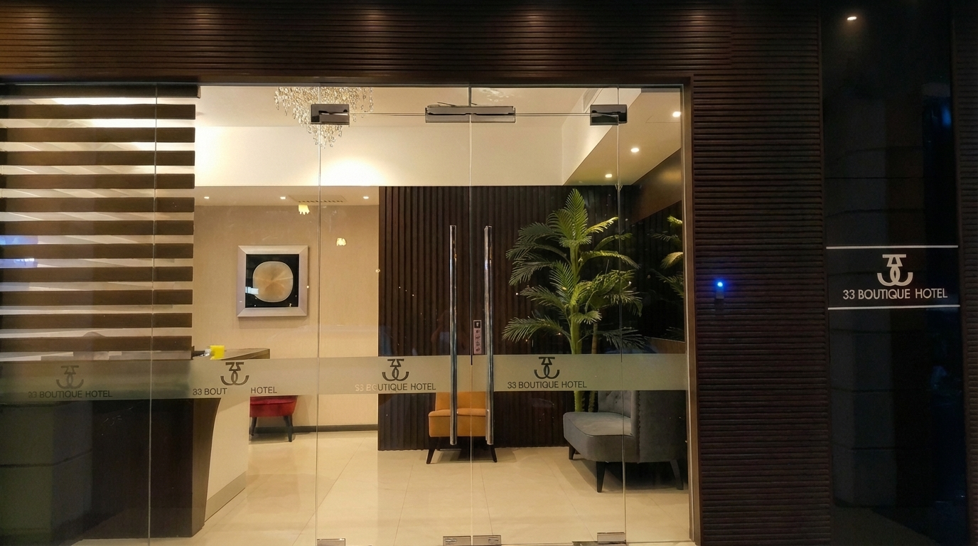 The warmly lit entrance of 33 Boutique Hotel